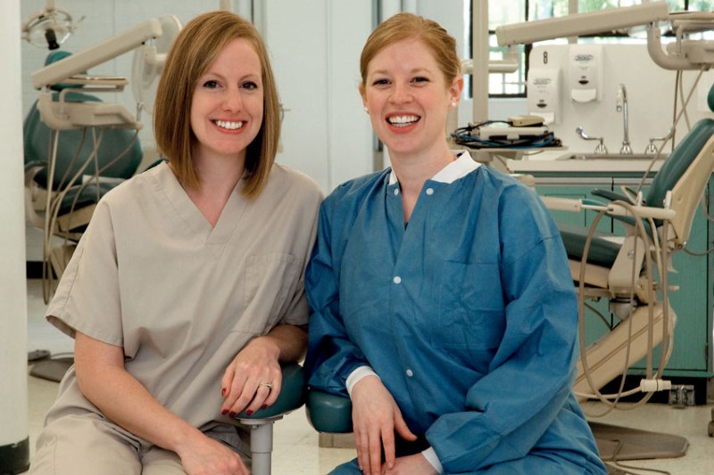 A health student cares for her SIMS patient.