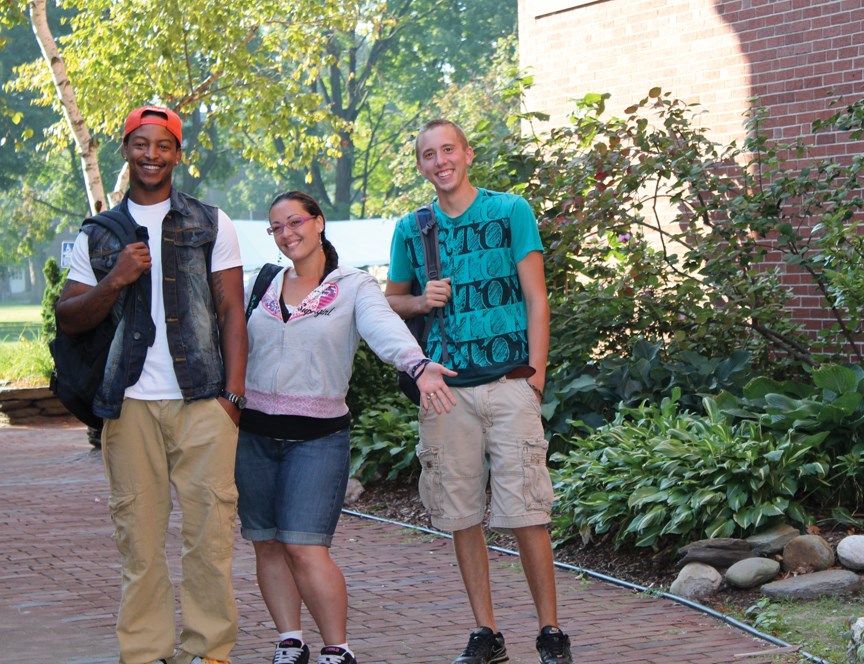 Summer scene of STCC students on the campus green.